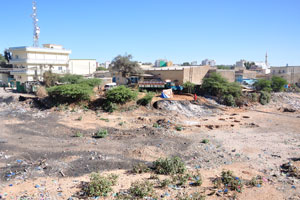 View of the buildings which were constructed on the bank of the dry river