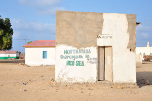 Another village on our way, an advertisement of the Red sea on the wall of the building