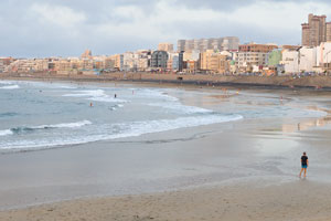 Being in the time of sunset on the beach of Las Canteras