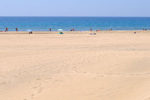 Maspalomas beach is a lovely place to sit or wander along sea front