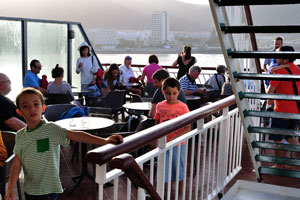 An open air area is filled with people on Volcán de Taburiente ferry