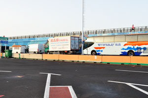 A line of vehicles just before embarking is at Los Cristianos ferry terminal