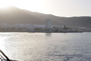 An amazing morning view of Los Cristianos city opens from Volcán de Taburiente ferry