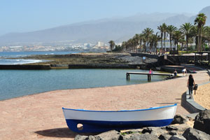 Las Americas seafront is on the background of island's mountains