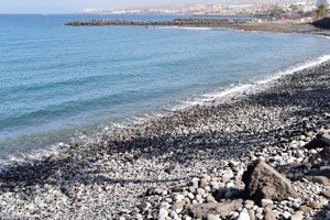 Playa de las Américas beach is a beach composed chiefly of surface pebbles