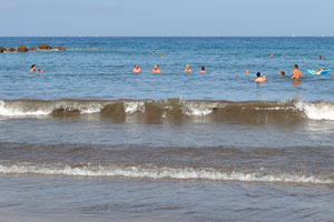 Low waves of Playa de Troya beach allow for fun in the water even with little children