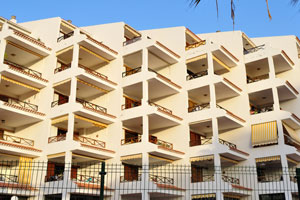 Apartments of the “San Marino Holidays” apartment complex as seen from “Avenida de Juan Carlos I” street