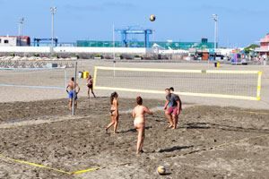 Beach volleyball is conducted on Playa de Los Cristianos beach