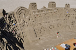 A sand sculpture is on Playa de Las Vistas beach