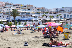 Playa de Las Vistas beach is a golden beach with sand imported from the Sahara Desert