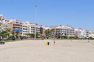Playa de Las Vistas beach stretches along the wide promenade that serves as a connection between Los Cristianos beach and Las Americas beach