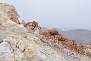 The edge of Mount Teide crater is mostly ochre in color