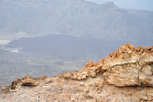 The red edge of Mount Teide crater is on the background of Teide National Park
