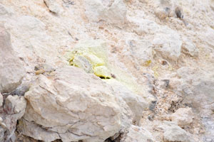 The bottom of Mount Teide crater is covered with yellow-green sulfur