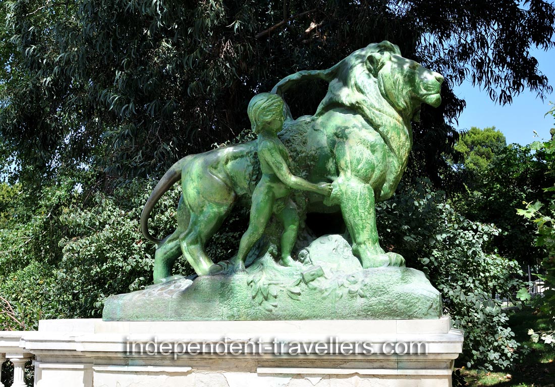 Lion and child statue is situated near the monument of Alfonso XII