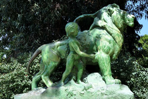 Lion and child statue is situated near the monument of Alfonso XII