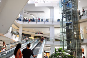There are modern elevators and escalators in the shopping mall