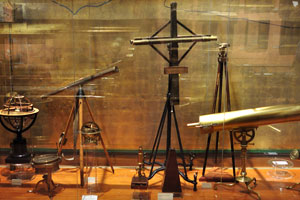 An armillary sphere “XVII-XVIII”, the Gregorian telescope “1750” and a marine chronometer “1767”
