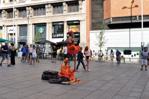 Street performers are on Plaza del Callao square