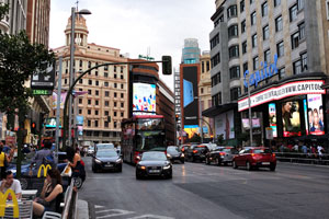 This is Gran Vía street in the area of Cine Capitol movie palace