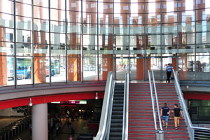An escalator is inside Madrid Atocha railway station