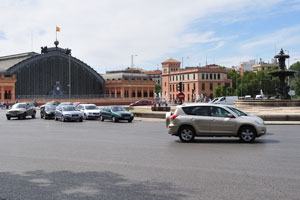 Plaza del Emperador Carlos V is on the background of old Atocha station