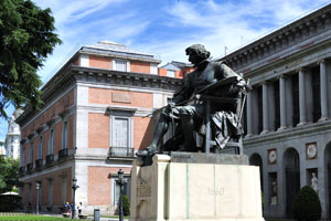 The statue of Spanish artist Velazquez is located beside the Prado museum