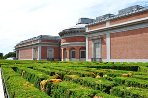 Low beautiful bushy hedges surround the Prado Museum