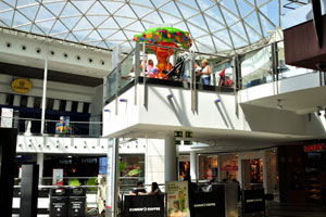 The children's merry-go-round is installed for fun in Príncipe Pío shopping center