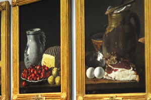 “Still life with plate of cherries, plums, jug and cheese” by Luis Egidio Meléndez is located at the middle of the upper row