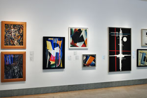 Suprematist Composition “1923” by Ilya Chashnik is the biggest one on this wall
