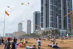 Children learn to fly kites from their elders