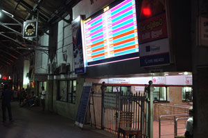 The electronic board shows the schedule of train departures at Fort railway station