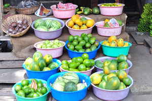 Papaya and watermelons are for sale at Green Market