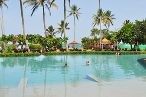 The swimming pool of Hikka Tranz by Cinnamon hotel