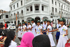 A school dance group performs before the festival starts