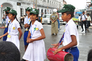 A school dance group includes a drummer