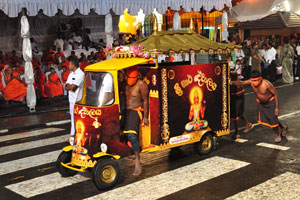 A painted festive auto-rickshaw