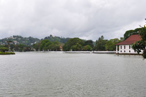 The shady path surrounding Kandy Lake provides a view of the hills and the town