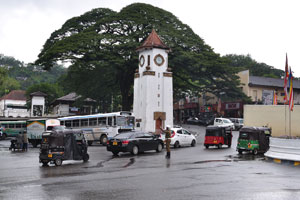 A policeman is near Kandy Clock Tower