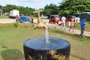 Water tap statue works as the fountain in the park of SLAF Unit