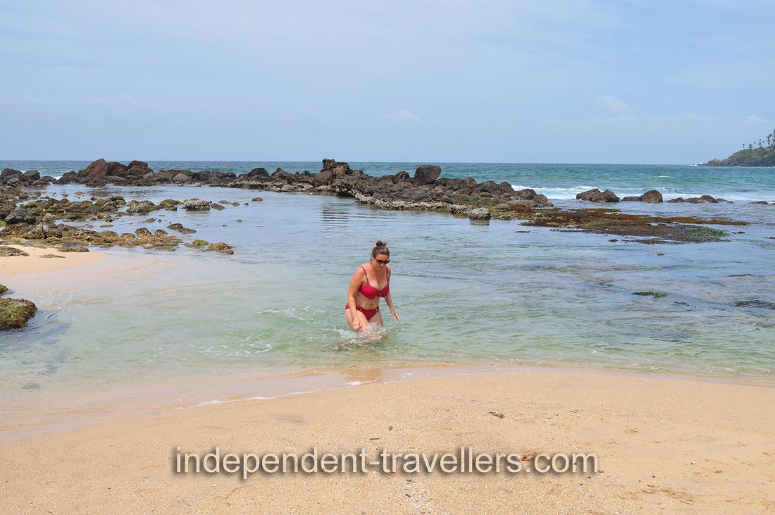 A woman is on the beach