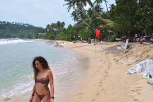 A red flag is on Mirissa beach in August