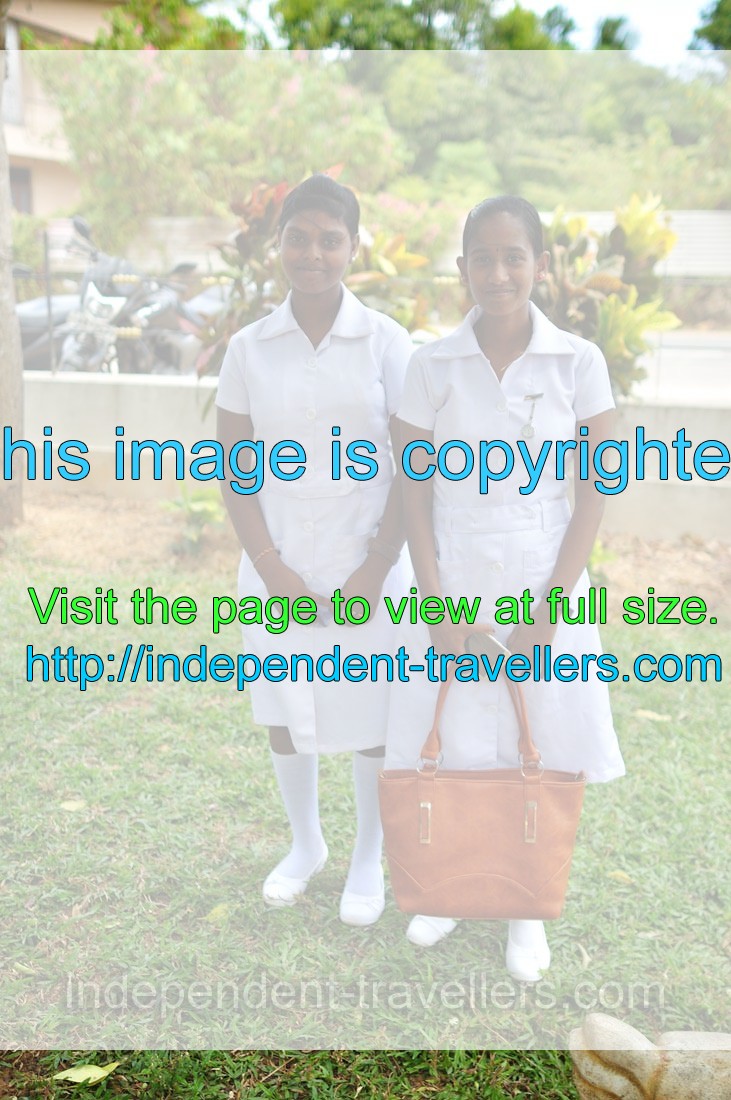 Two young girls struck poses in Jaffna