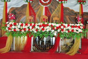 The altar of Divine Mercy Shrine catholic church is decorated with flowers