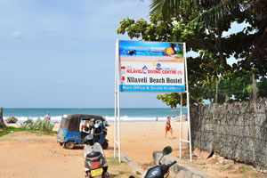 Sign board reads “Nilaveli Diving Center”