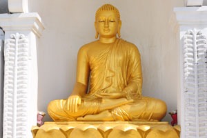One of the golden statues of Japanese Peace Pagoda