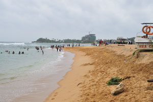 Local people are at the east side of the beach