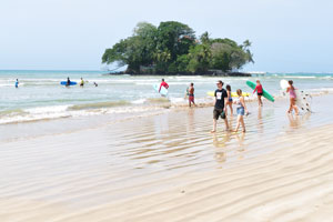Surfers are on Weligama Beach
