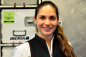 A stunning flight attendant from the Iberia (IB) airline is on the flight from Accra to Madrid